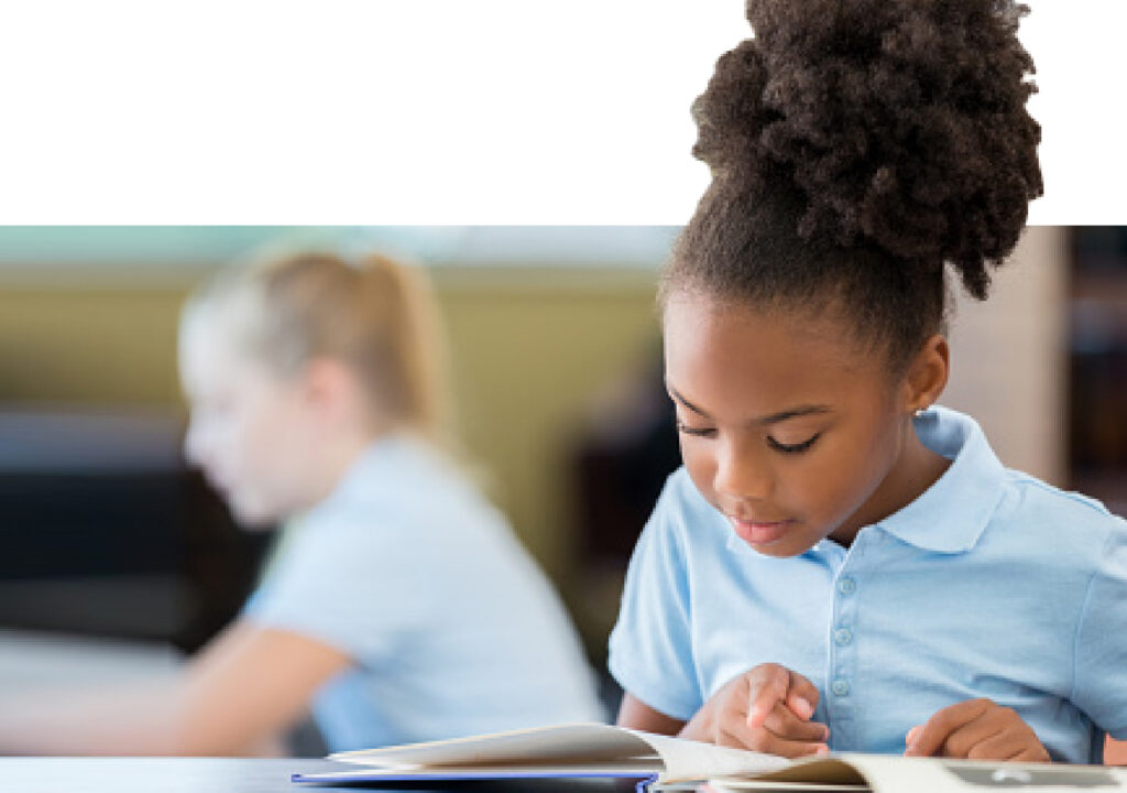 A young girl reading